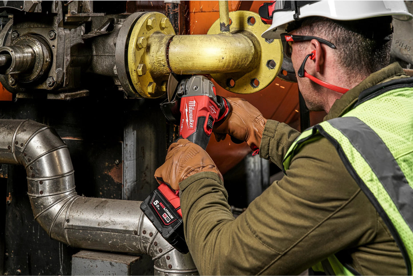 M18 125 mm angle grinder with brake and paddle switch + 2 × 5 Ah batteries + charger + Milwaukee case, M18 FSAG125XB-502X
